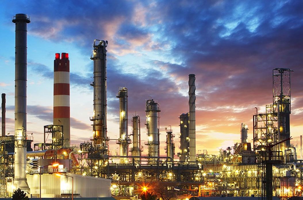 Power plant chimneys at dusk